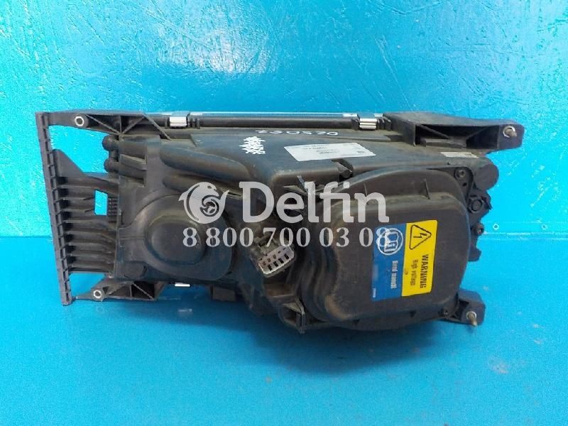 2000057 Фара правая RH Scania